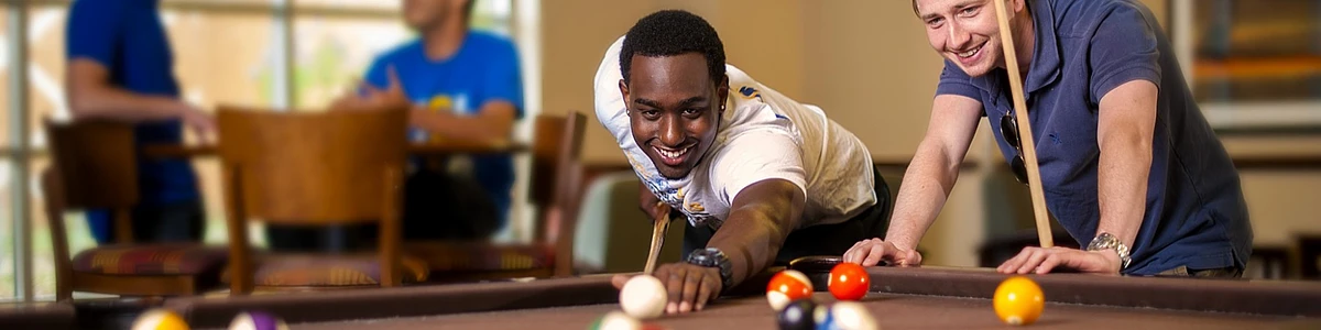 Students playing pool on Angelo State's campus