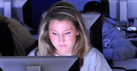 Student staring at a computer screen